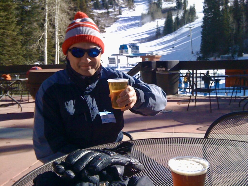 The author having a beer at one of the mountain restaurants at Snowbird, Utah.
