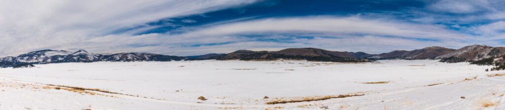 Snow covered panoramic of Valles Caldera National Preserve in New Mexico.