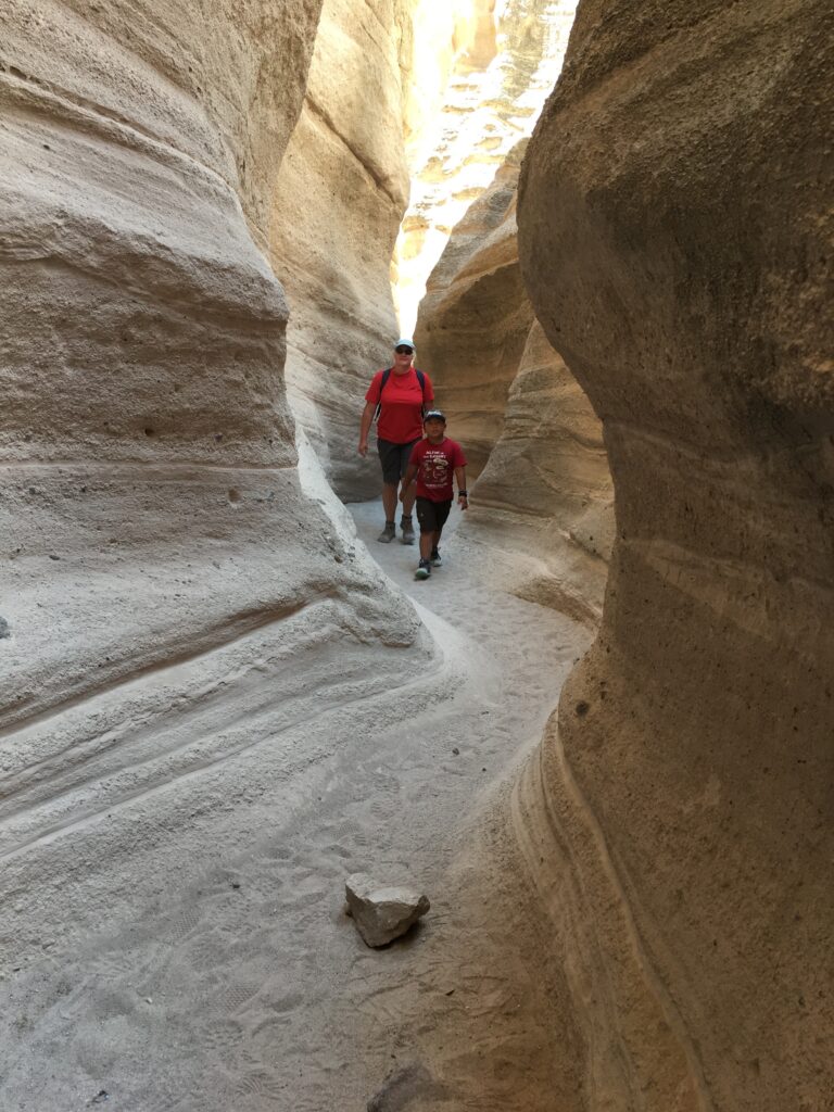 The narrow part of this canyon had smooth sandy floors and smooth rock walls.