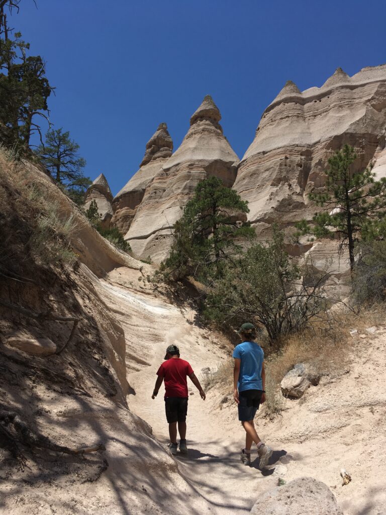 As you emerge from the narrower part of the canyon the tent rock formations become visible.