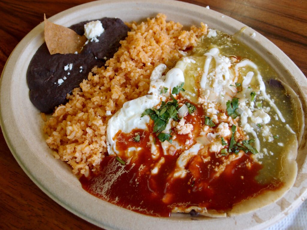 Huevos Rancheros, a popular southwestern breakfast dish, with red and green chili sauce.