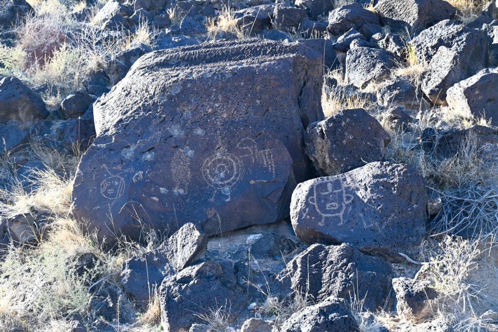 Petroglyph images carved by Ancestral Pueblo people in Petroglyph National Monument, New Mexico.