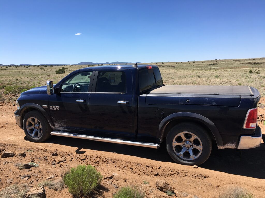 Our truck driving along County Road 42. A large section of County Road 42 is unpaved dirt road that can be impassable when wet.