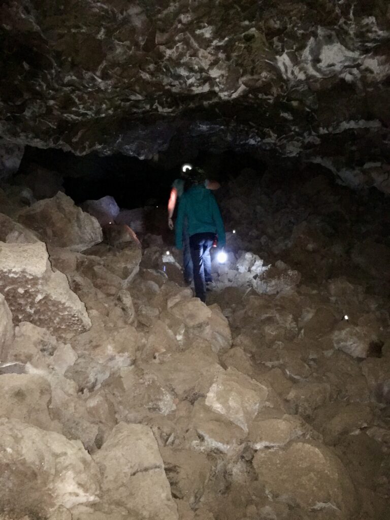 These lava tube caves can be dark, rocky and rough inside.
